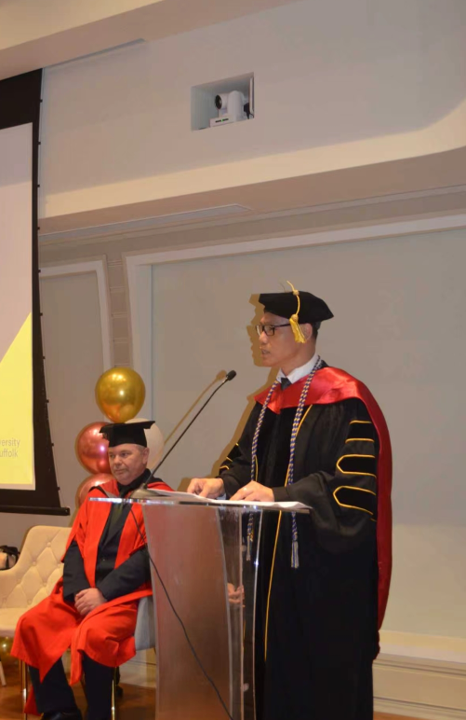 Dr. Alan Go — addressing graduation ceremony